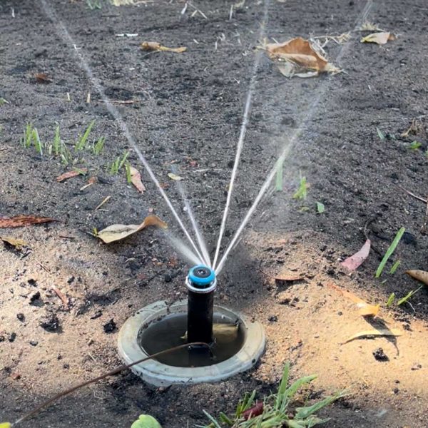 How do I increase water pressure in my sprinkler system?