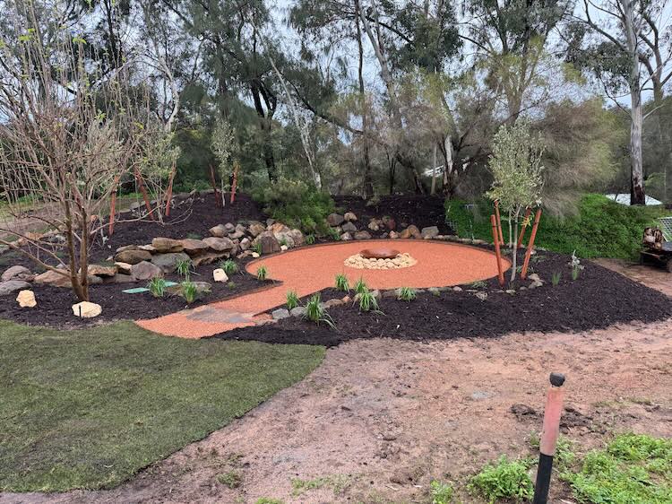 Beautiful Australian backyard with a fire pit