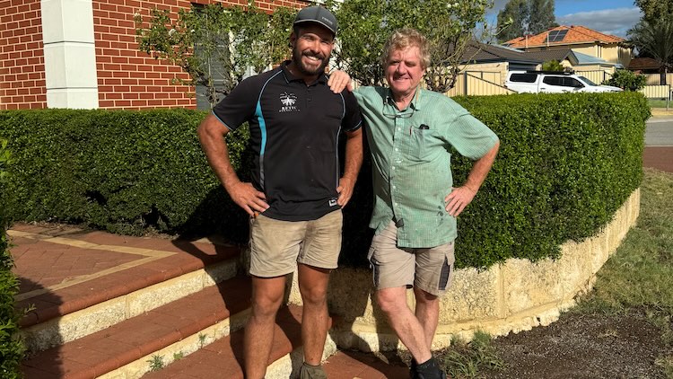 Luke with a customer during an initial consultation